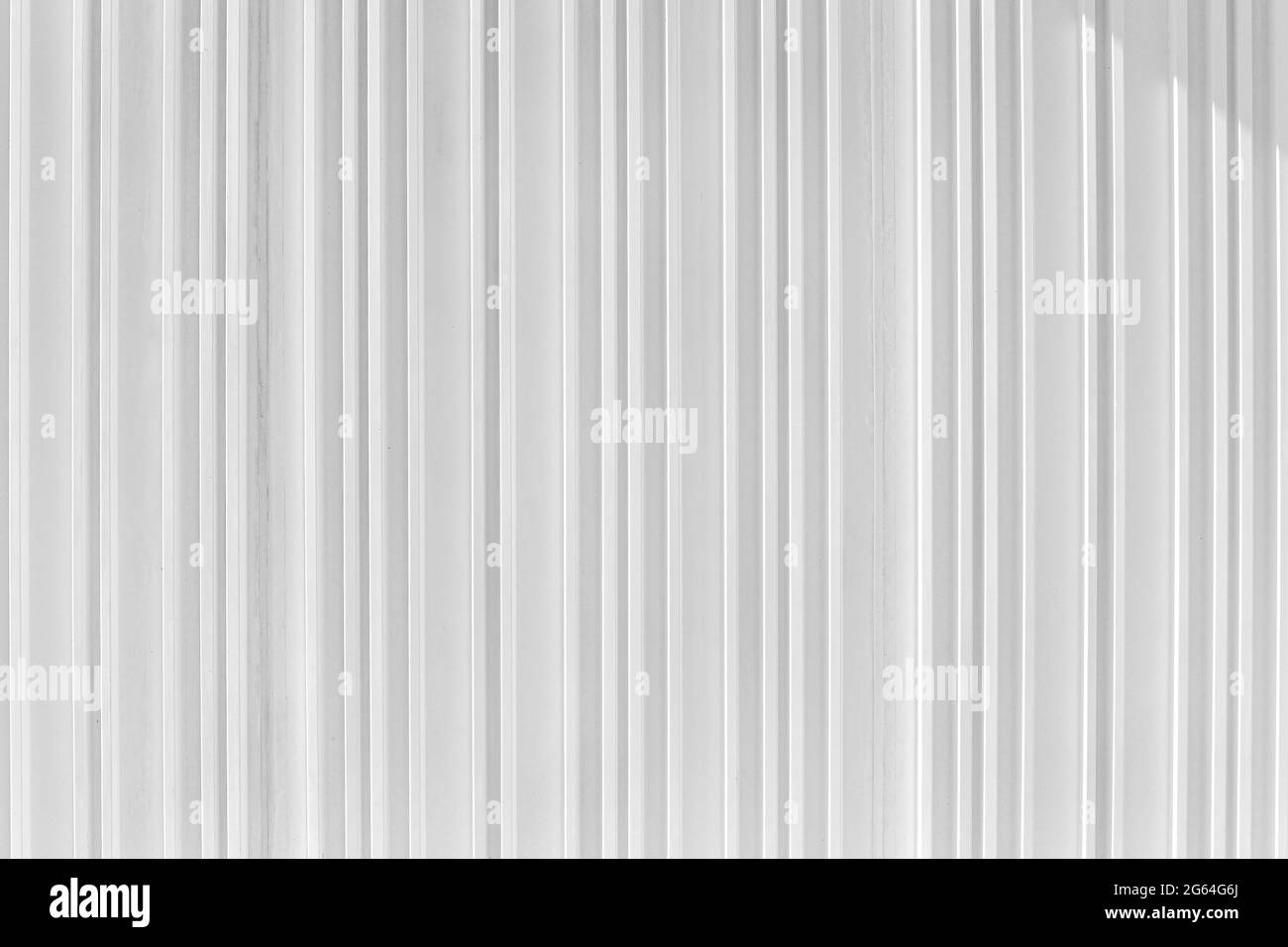 Decorative concrete vertical groove pattern of a building facade