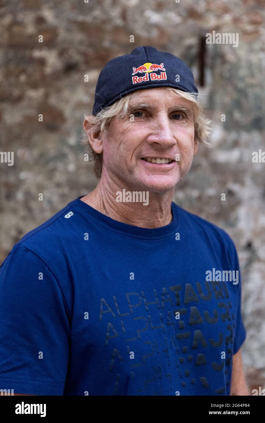 Hamburg, Germany. 02nd July, 2021. Robert 'Robby' Staunton Naish, American surfer and multiple world champion in windsurfing, stands for the presentation of the film 'The Longest Wave' at the Zeise Kino in Hamburg. Credit: Markus Scholz/dpa/Alamy Live News Stock Photo