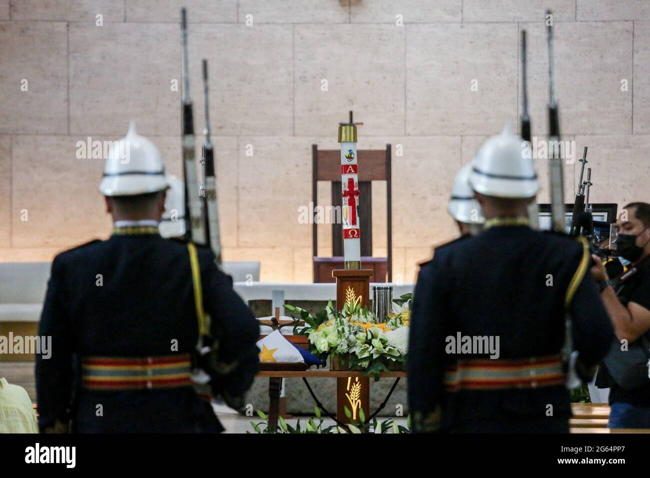 Military honor guards change shifts during the wake of former President Benigno Aquino III at the Ateneo Church of Gesu in Quezon City, Metro Manila, Philippines. Stock Photo