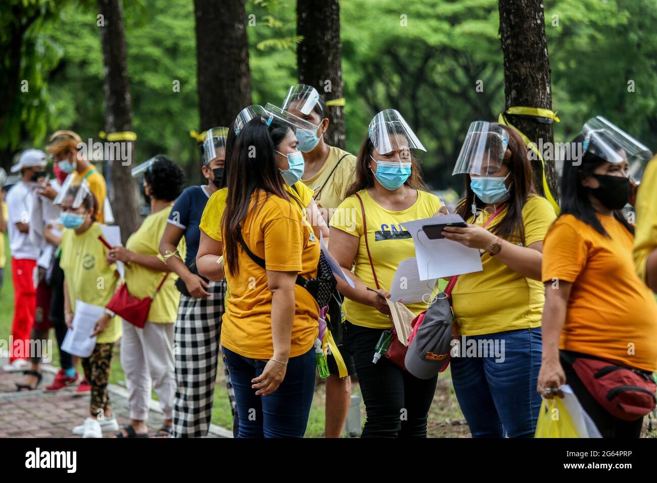 Supporters of former President Benigno Aquino III queue for a public viewing during his wake at the Ateneo Church of Gesu in Quezon City, Metro Manila, Philippines. Stock Photo