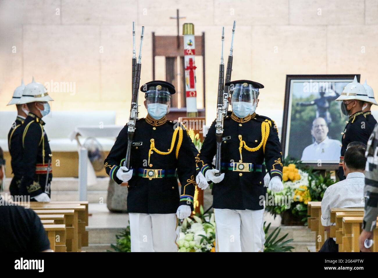 Military honor guards change shifts during the wake of former President