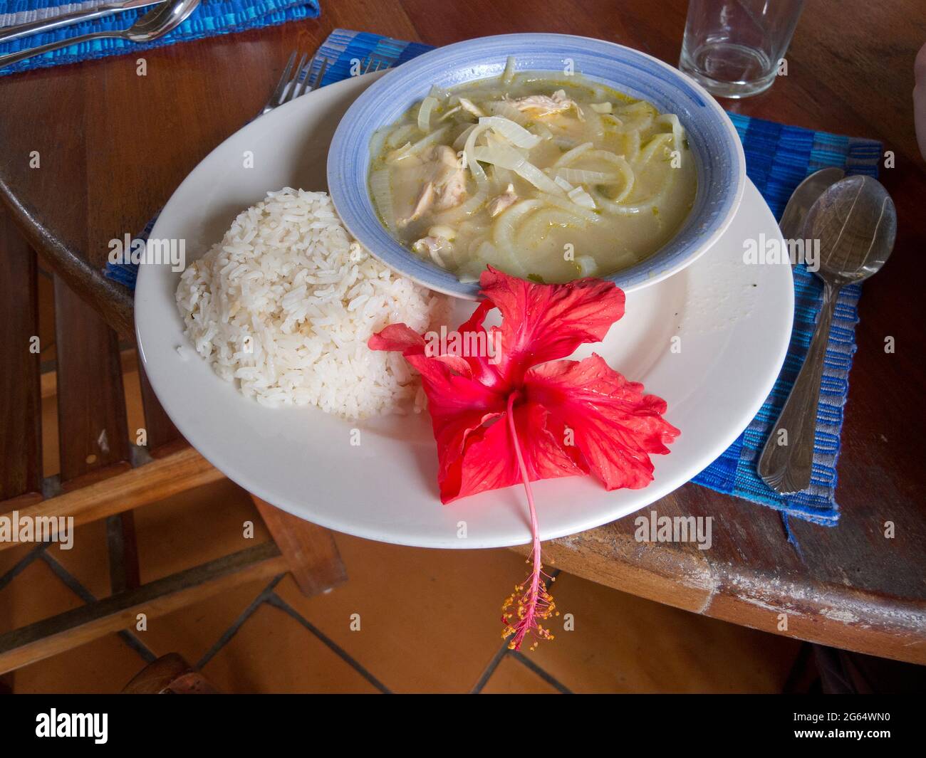 A lunch of homemade chicken and onion soup with rice. Stock Photo
