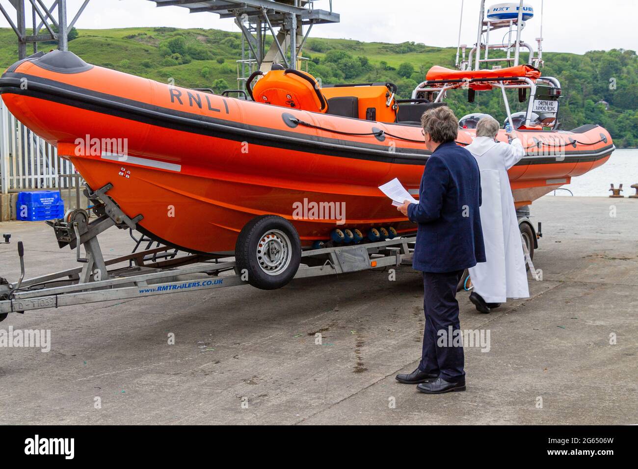 RNLI Atlantic 85 RIB being blessed by church clergy Stock Photo