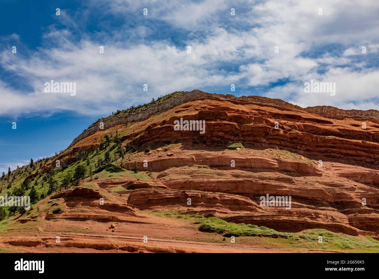 Red rocks of the Triassic Chugwater Formation in the Bighorn Basin along Chief Josepth Scenic Byway, Shoshone National Forest, Wyoming, USA Stock Photo