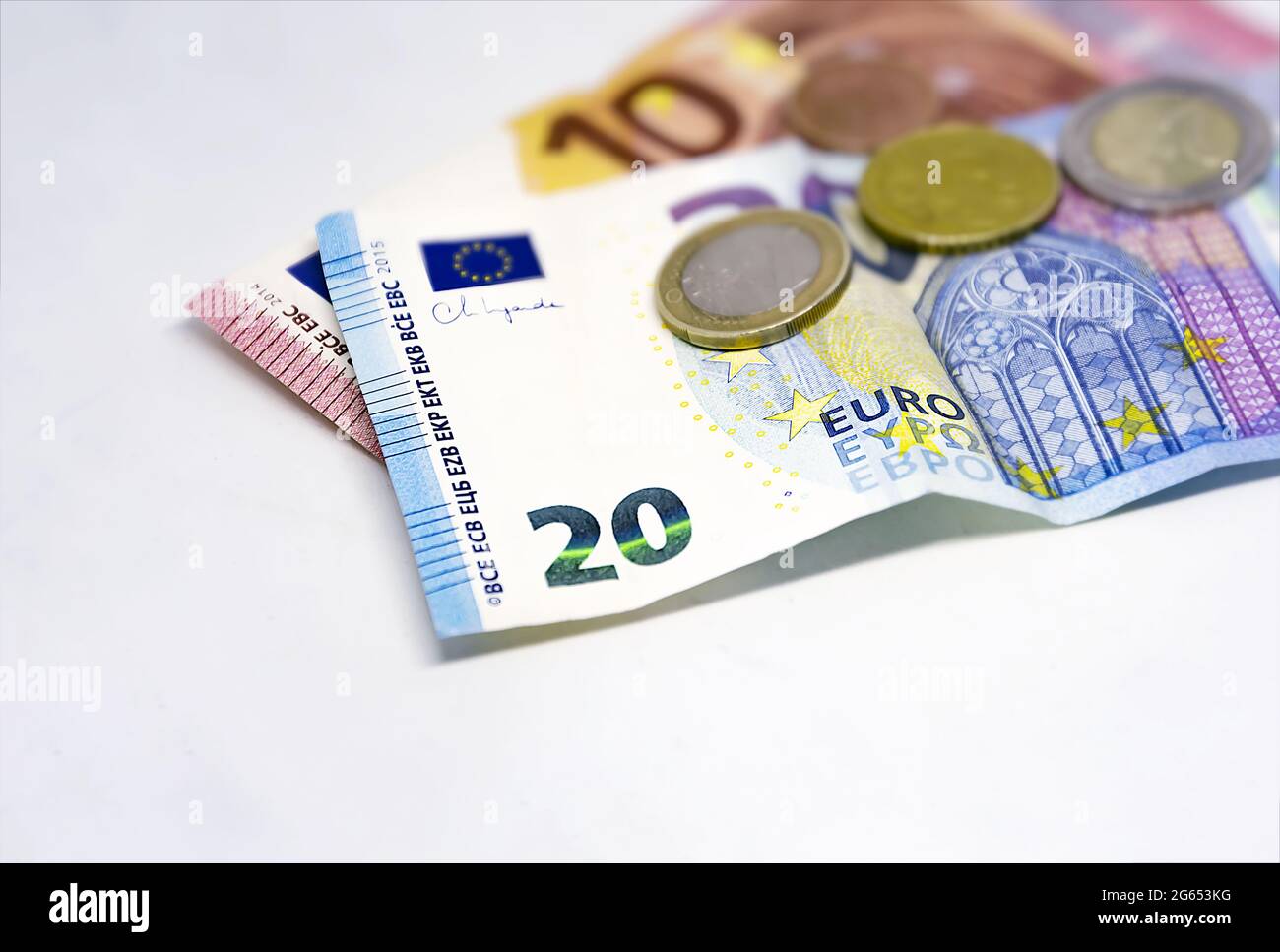 European Union coins and banknotes of different values. The euro is the European currency. Finance, economy and business. Cash and savings Stock Photo