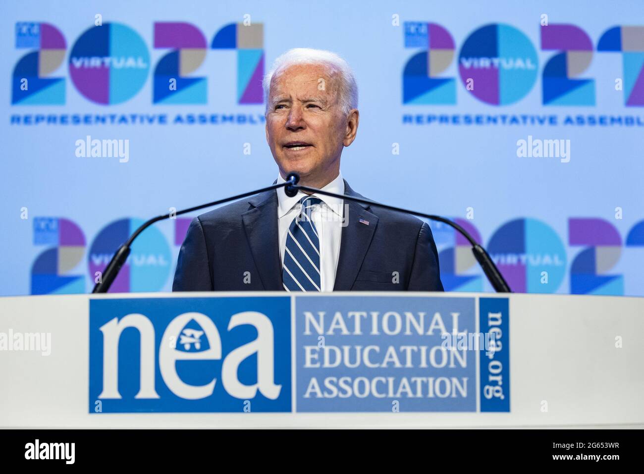Washington, United States. 02nd July, 2021. U.S. President Joe Biden speaks during the National Education Association's annual meeting and representative assembly event in Washington, DC, U.S., on Friday, July 2, 2021. U.S. job growth accelerated in June, suggesting firms are having greater success recruiting workers to keep pace with the broadening of economic activity. Photo by Samuel Corum/UPI Credit: UPI/Alamy Live News Stock Photo