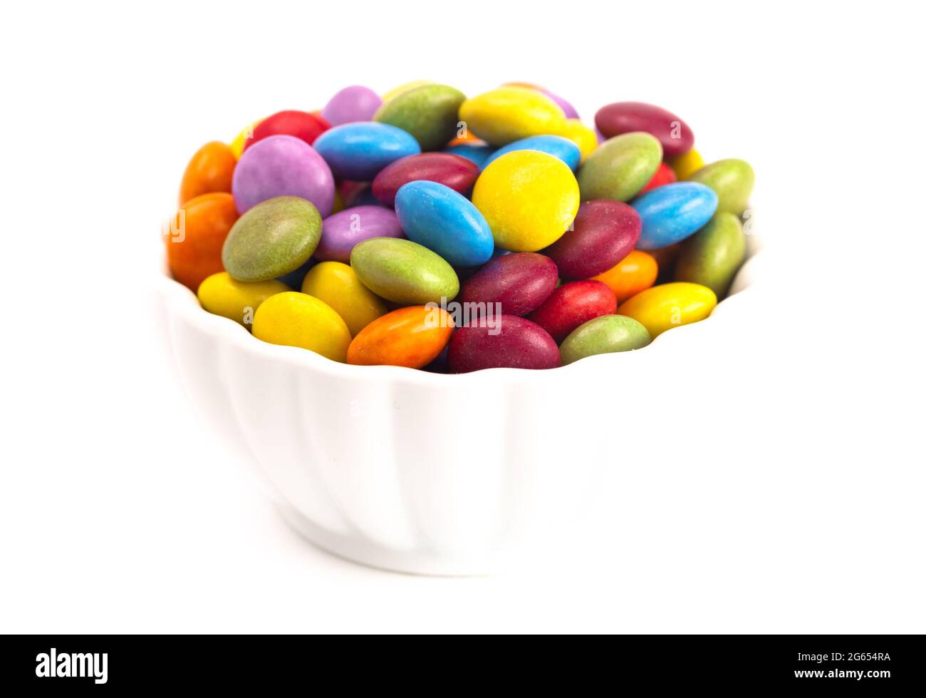 Candy Coated Multicolored Chocolates  on a White Background Stock Photo