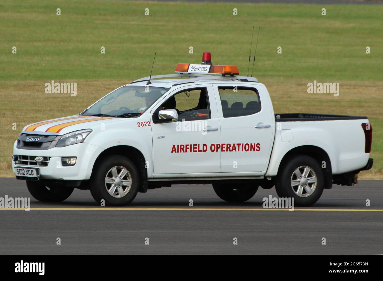 0622 (SC12 XCD), an Isuzu D-Max operated by the Prestwick Airport Airfield Operations department, at Prestwick Airport in Ayrshire, Scotland. Stock Photo