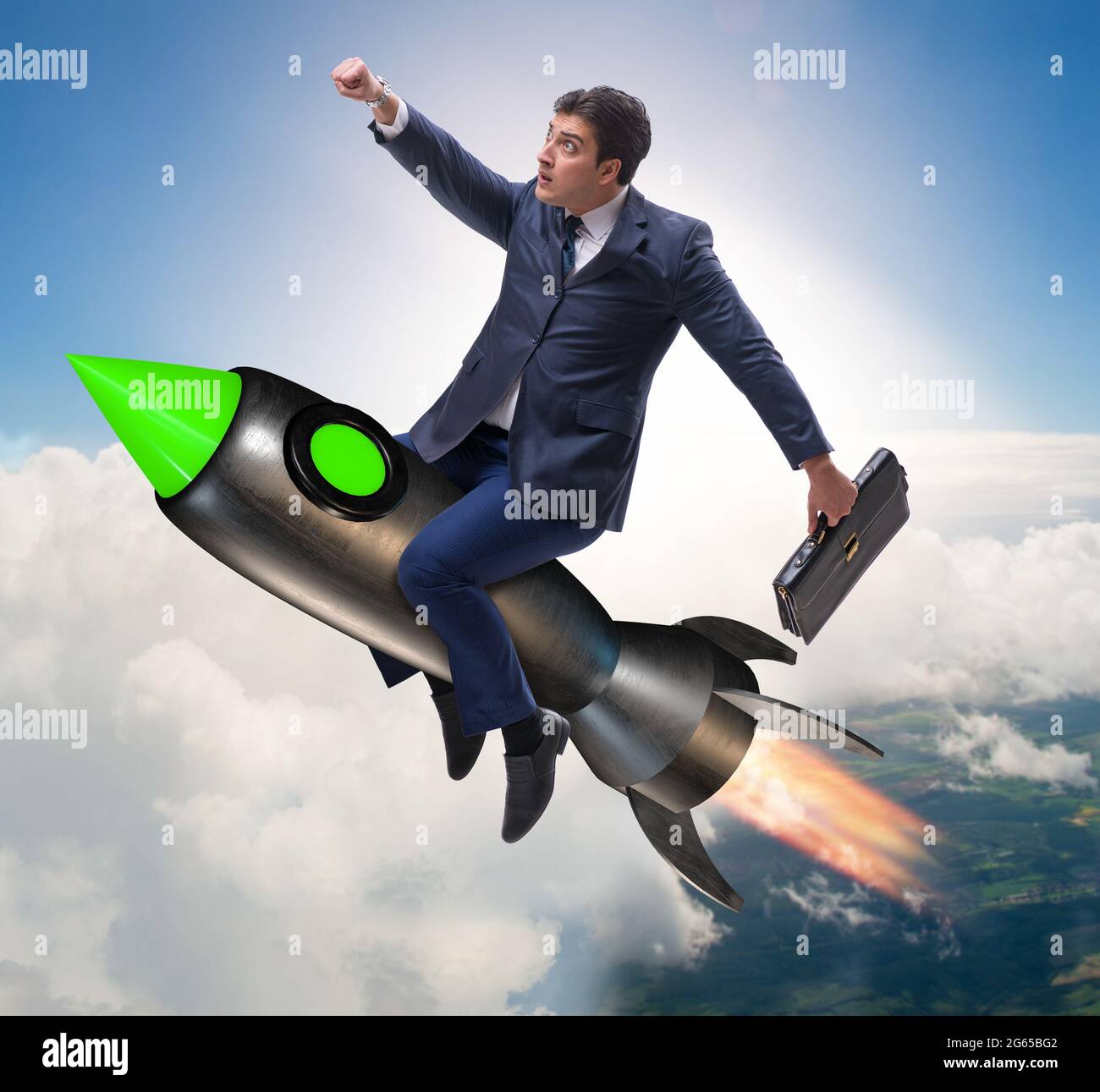 The male businessman flying on rocket in business concept Stock Photo ...