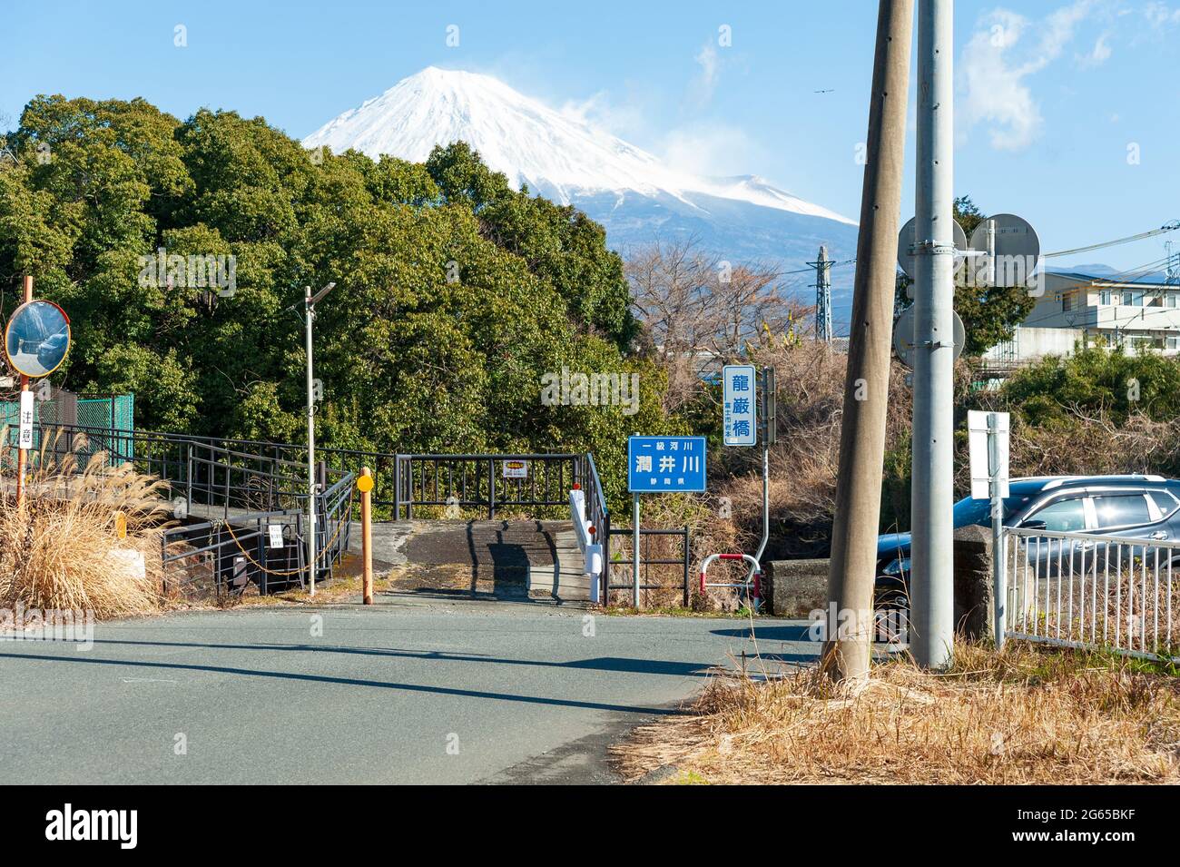 City boundary between Fuji and Fujinomiya, Shizuoka prefecture, Japan. Background with Mount Fuji. Horizontal shot. Stock Photo