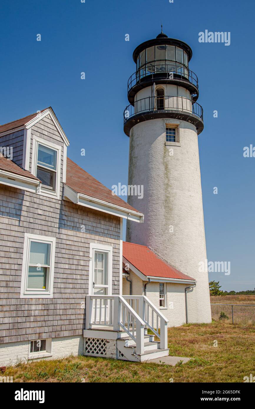 The Highland Light, also known as Cape Cod Light, is an active lighthouse on the Cape Cod National Seashore in North Truro, Massachusetts. Stock Photo