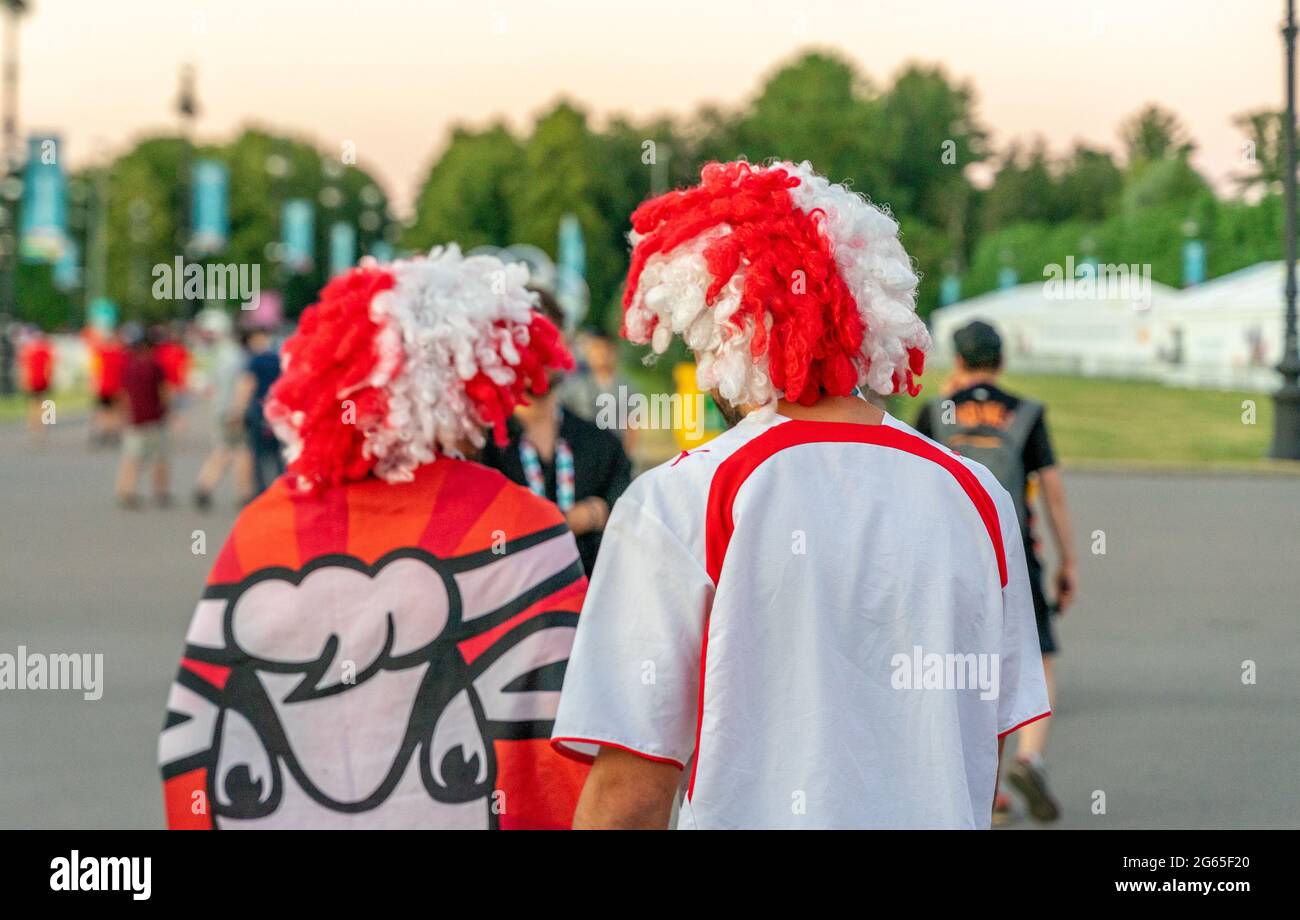 Swiss football fans in national outfits, with white-red wings-caps, after  quarterfinal game Switzerland-Spain, UEFA 2020, St Petersburg, Russia Stock  Photo - Alamy