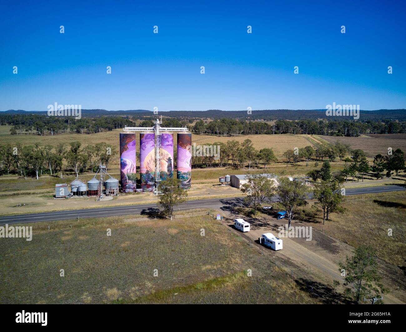 Aerial of the Three Moons artwork mural painted on grain silos near Monto North Burnett Queensland Australia Stock Photo