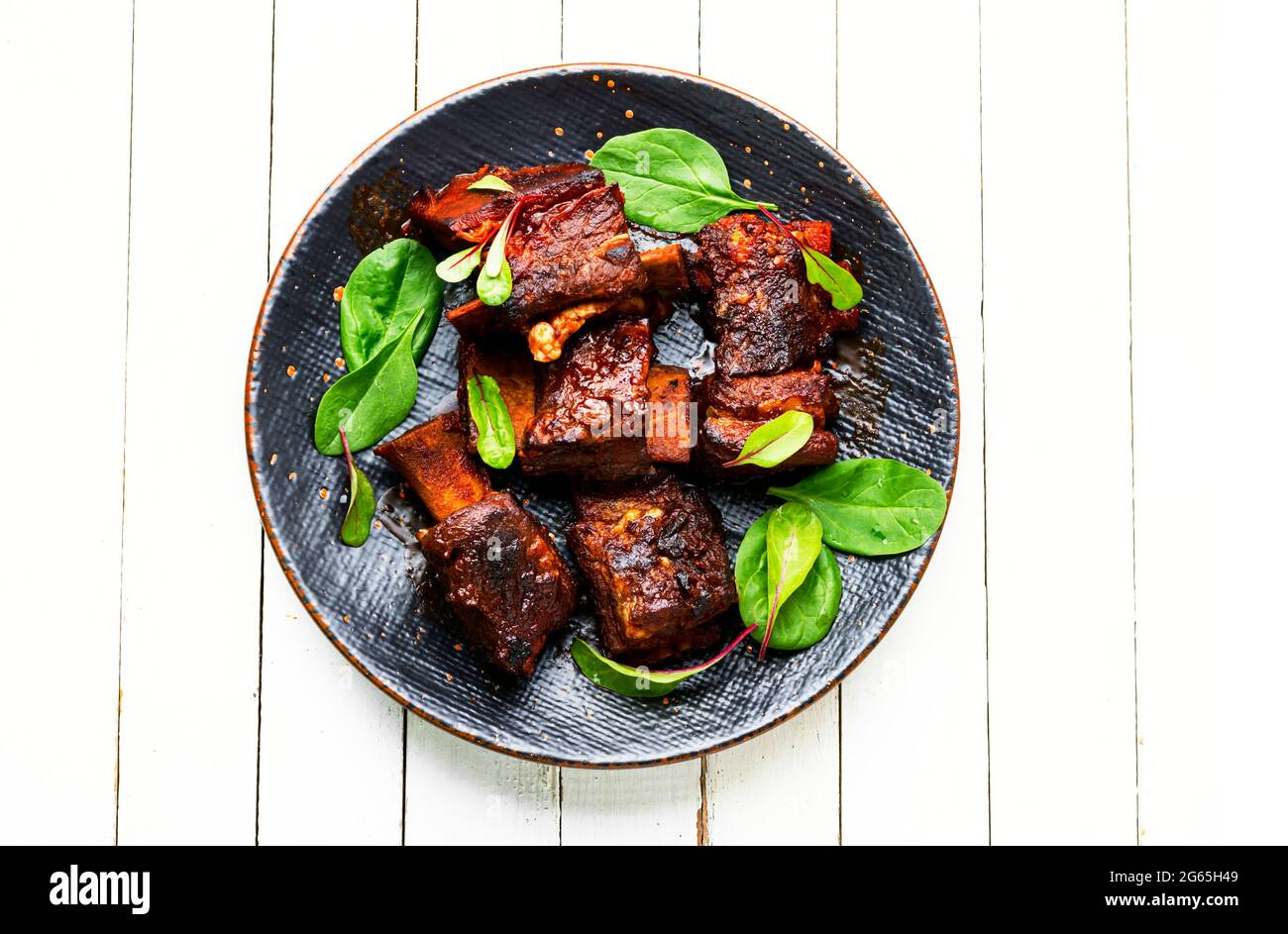 Tasty BBQ beef ribs seasoned with spicy sauce Stock Photo