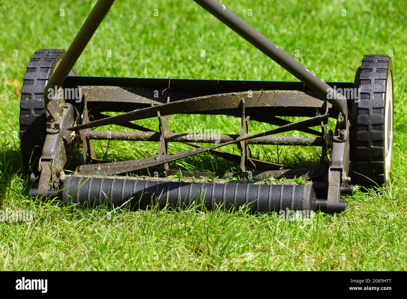 Close up hand push lawn mower in the grass of the lawn in a Dutch garden in July Stock Photo Alamy