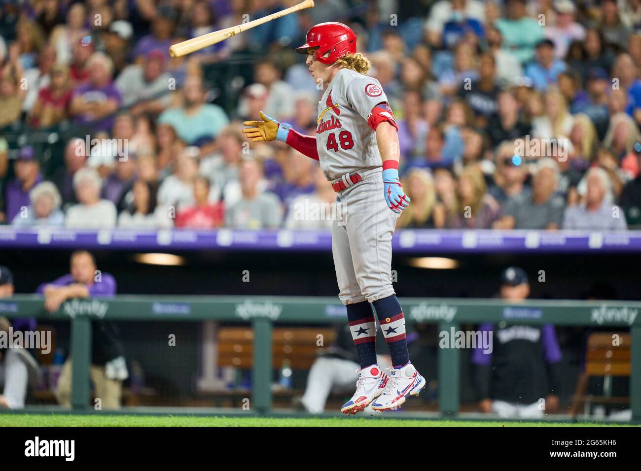 July 2. 2021: Saint Louis third basemen Nolan Arenado (28) swings the bat  during the MLB game between the Saint Louis Cardinals and the Colorado  Rockies held at Coors Field in Denver