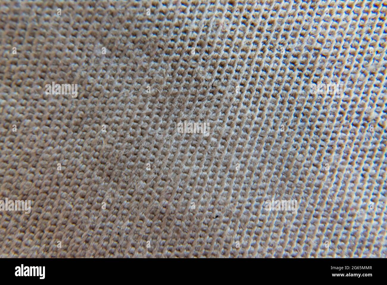 macro photo of a fiber cloth texture, close up threads or strings, yarn ...