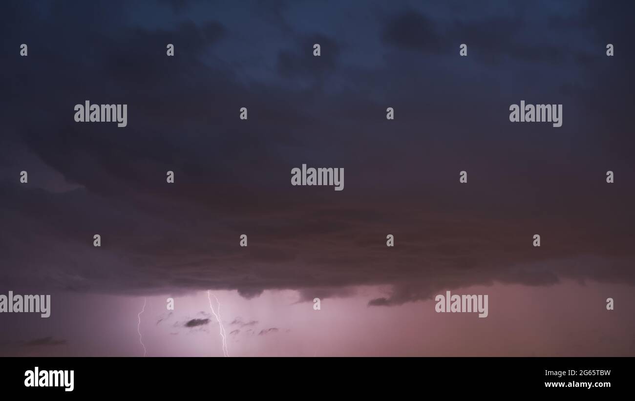 Evening sky storm clouds with lightning, background Stock Photo - Alamy
