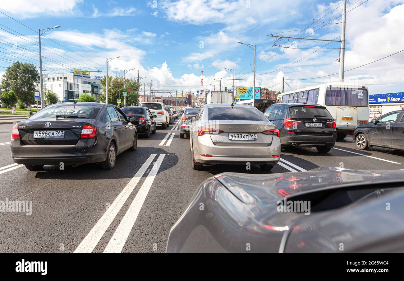 Samara, Russia - July 2, 2021: Cars drive along city street with multi-lane  traffic in summertime Stock Photo - Alamy