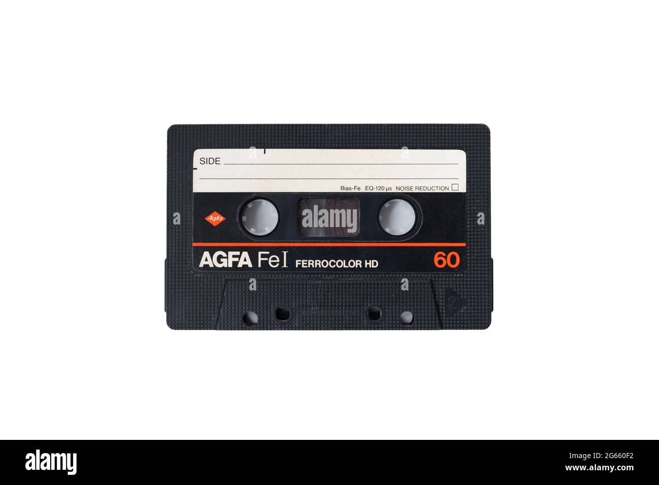 Red AGFA audio cassette, retro audio technology, on white background Stock Photo