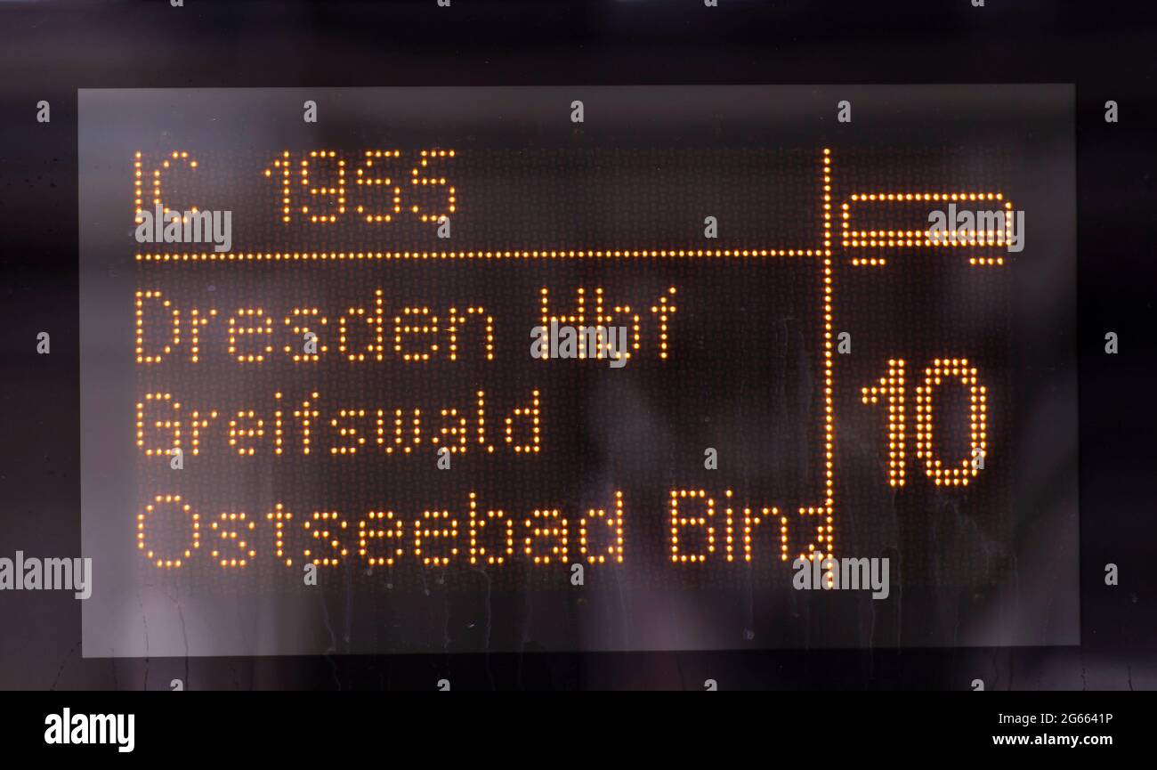 03 July 2021, Saxony, Dresden: A carriage escort sign on an IC indicates the new Dresden-Island Rügen connection. From 3 July to 5 September, a Deutsche Bahn IC train will run on Saturdays and Sundays on the route between Dresden and Binz on the Baltic island of Rügen as a direct connection. Photo: Matthias Rietschel/dpa-Zentralbild/ZB Stock Photo