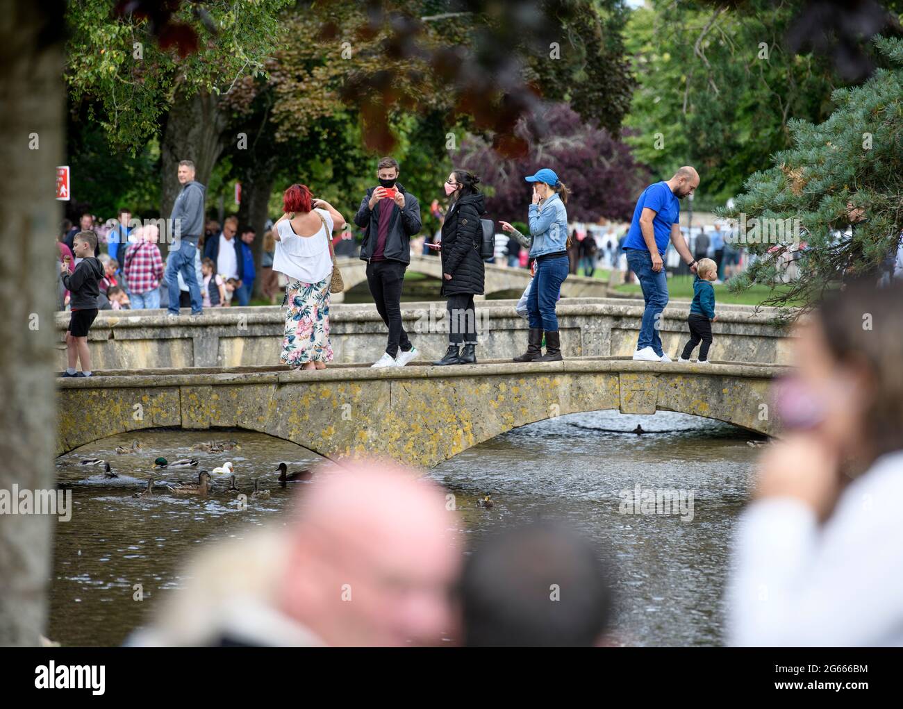 Scenes in the Cotswold village of Bourton-on-the-Water which experienced unprecedented visitor numbers during the Coronavirus pandemic, Aug 2020 Stock Photo