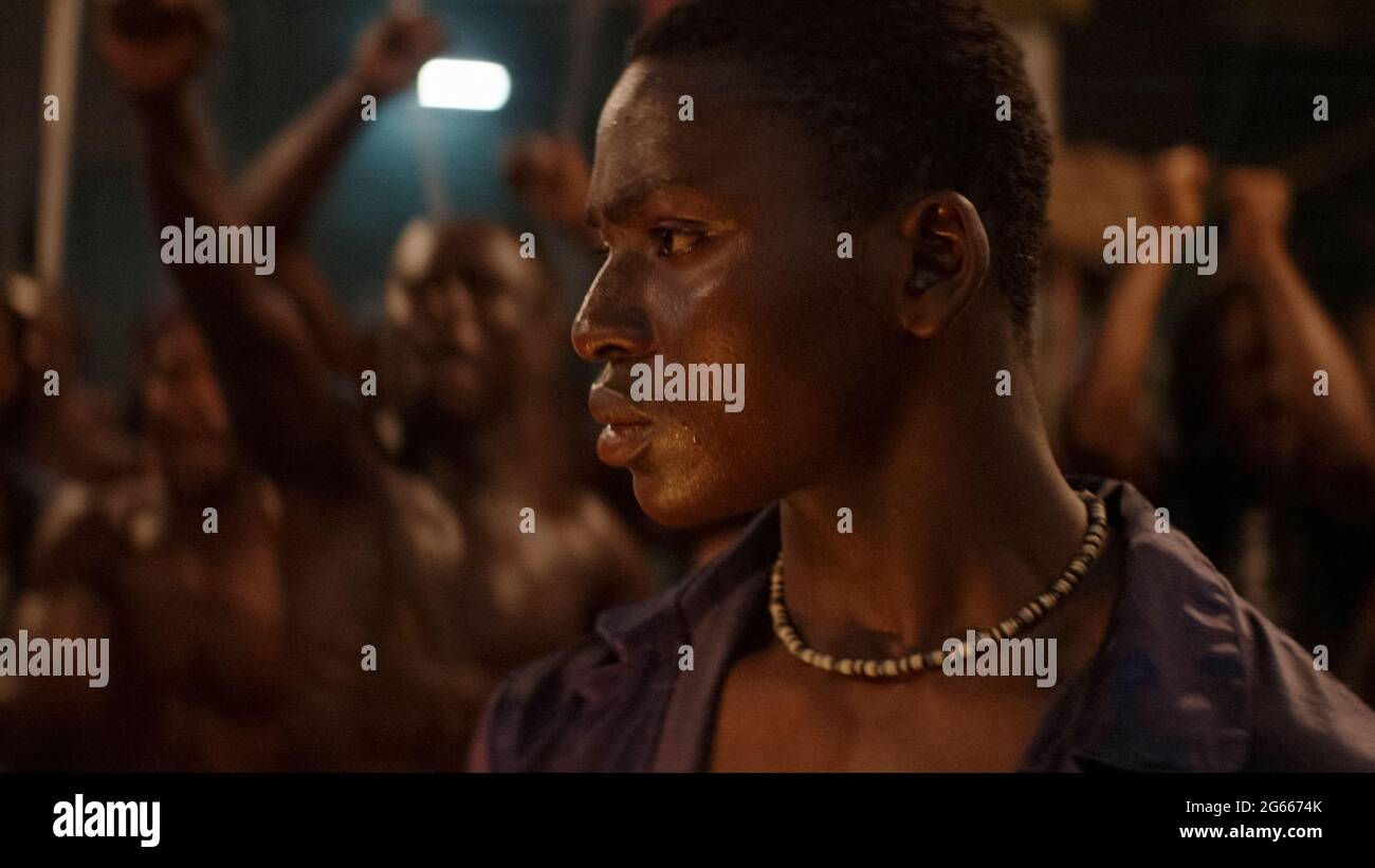 Night of the Kings [La nuit des roi] (2020) directed by Philippe Lacôte as and starring Bakary Koné as Roman, a newly arrived prisoner who must tell a story to the other prisoners. Stock Photo