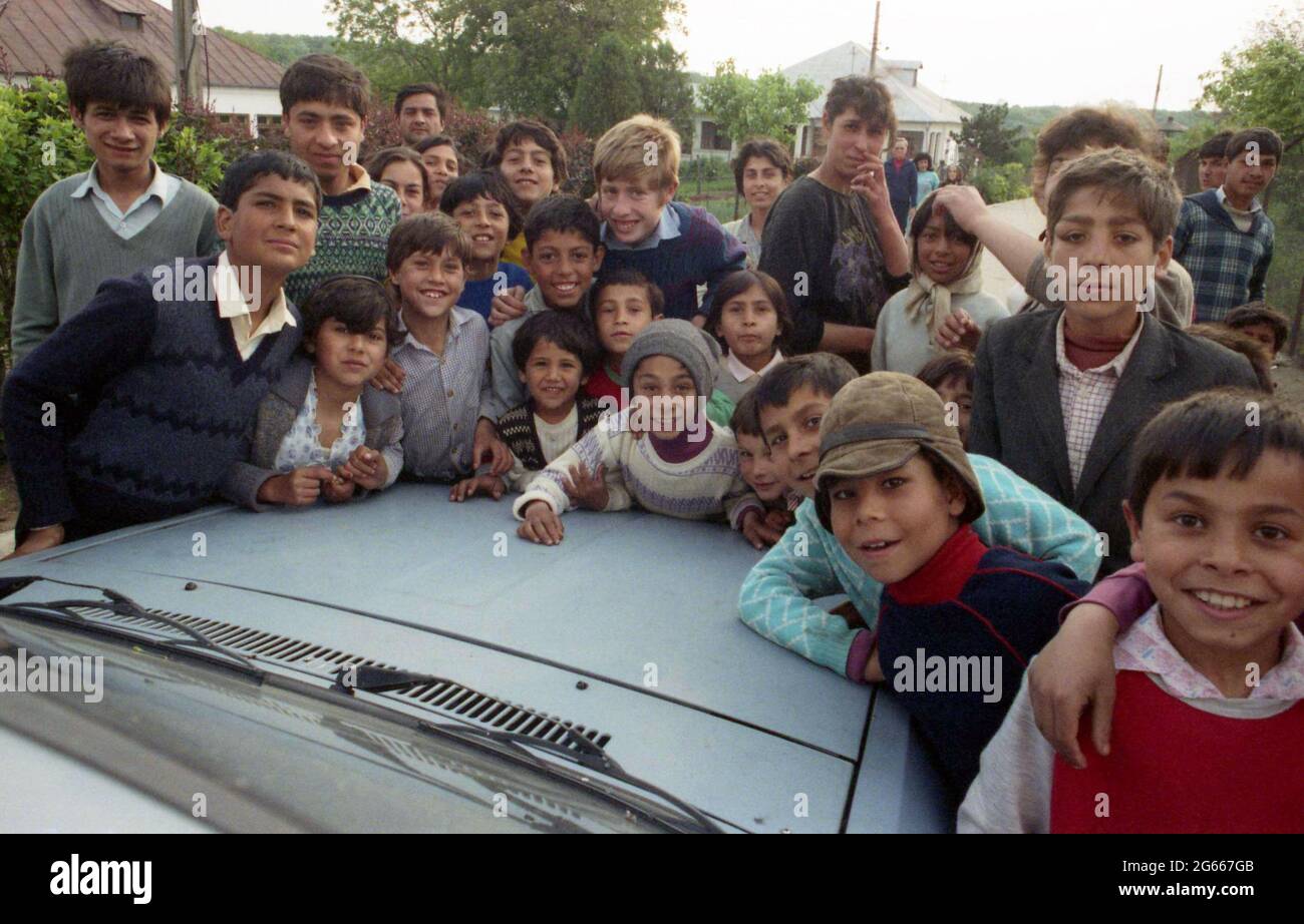 Group of young Gypsy (Rroma/ Romani) in a small village in Romania, in ...