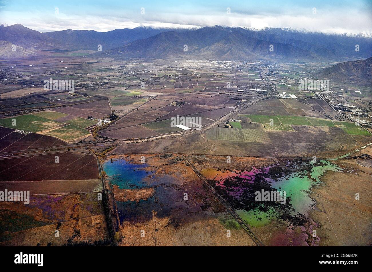 Aerial, flying at 10000 meters, southern Chile, over Patagonia.  Shows a romantic landscape, other features. Wide view. Refracted light. Colours. Stock Photo