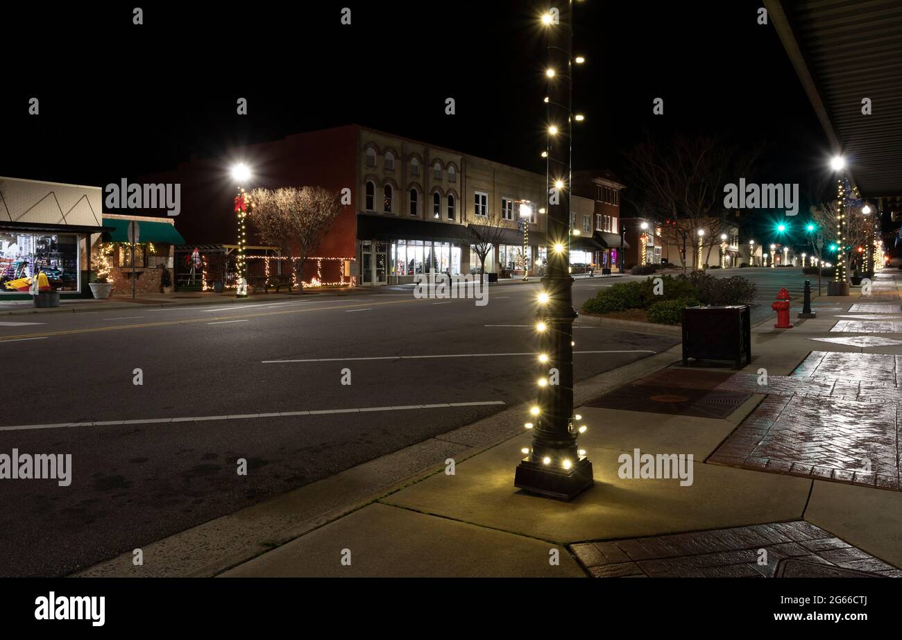 Main street in the small city of Raeford NC at night illuminuated