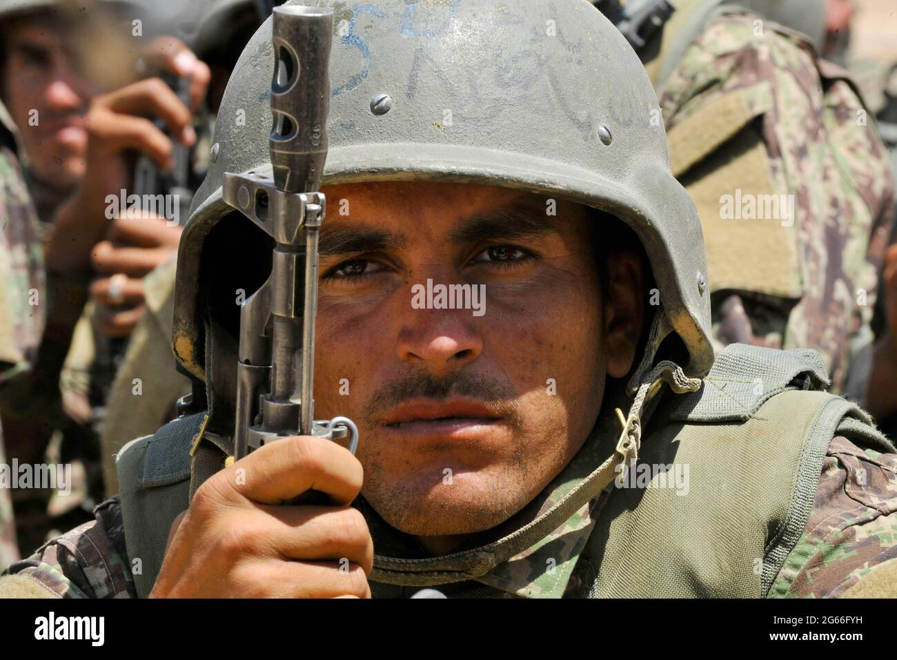 KABUL, AFGHANISTAN Kabul - 11 June 2018 - An Afghan National Army Territorial Force soldier watches security demonstrations during a military exercise Stock Photo