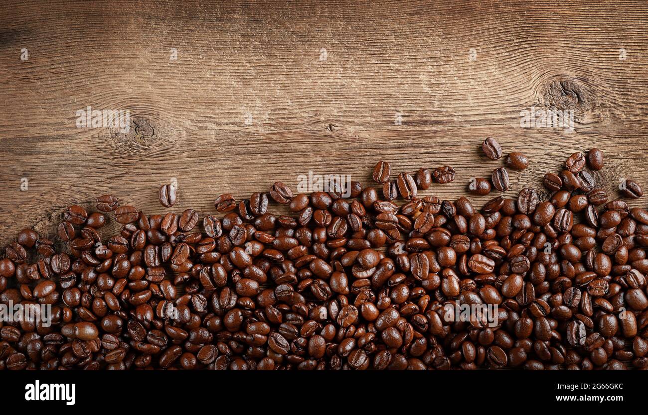 Coffee background on rustic wooden texture. Flat lay, copy space Stock Photo