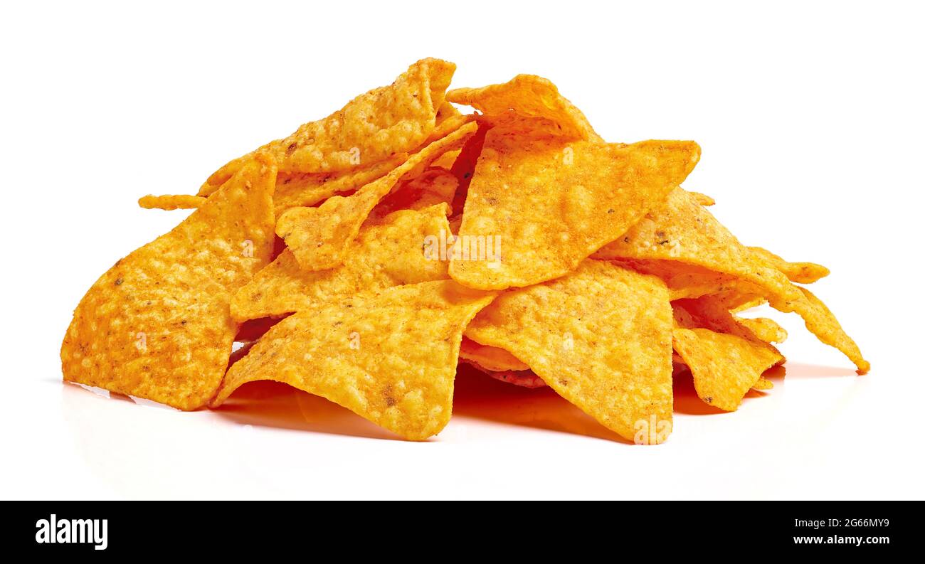 Heap of nachos corn chips isolated on white background Stock Photo
