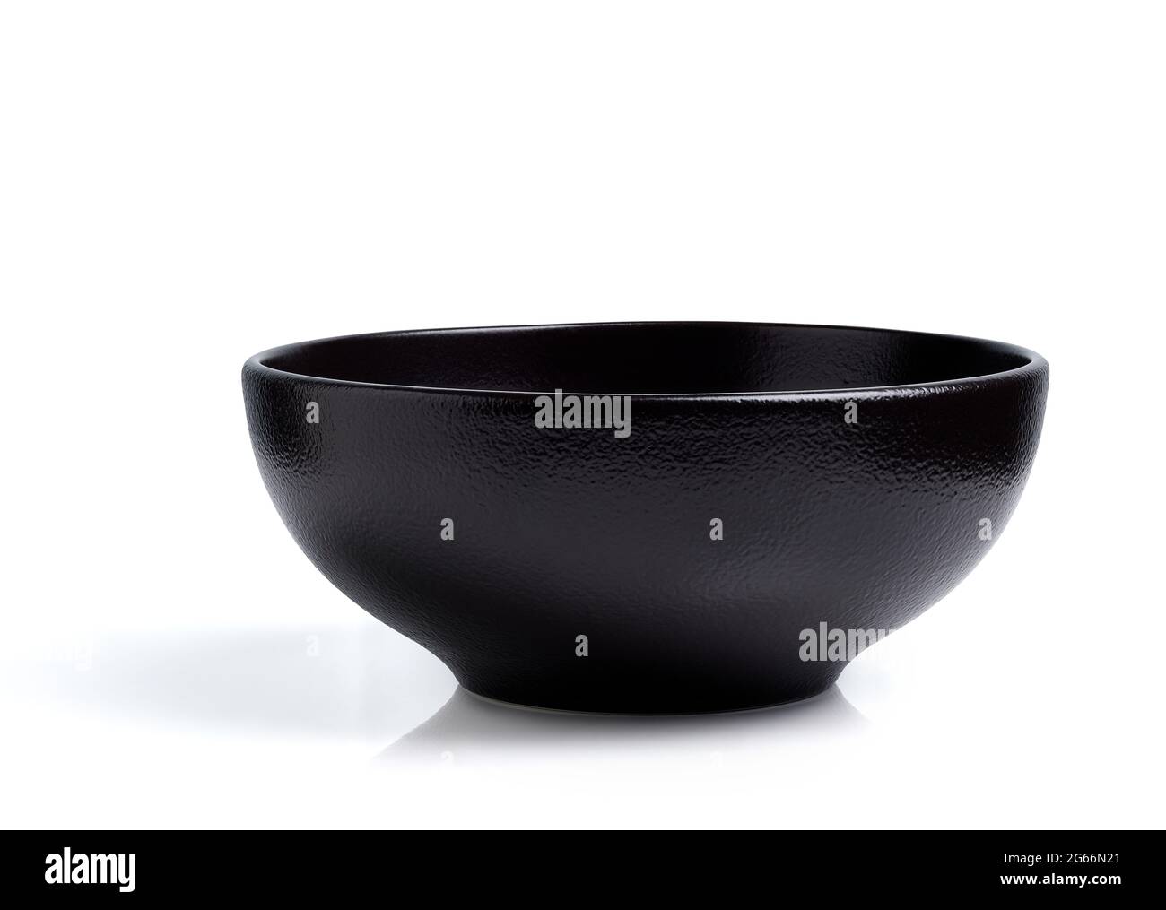 Empty black ceramic bowl isolated on white background Stock Photo