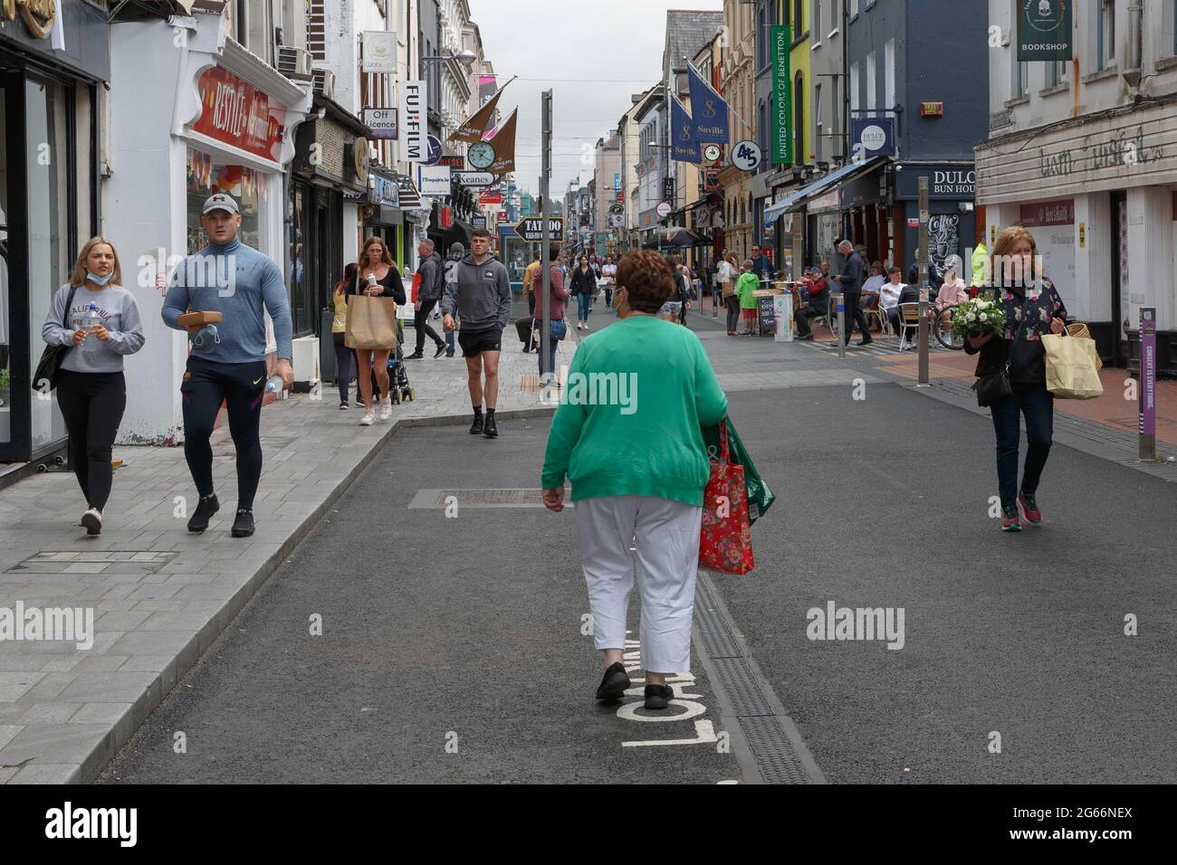 Cork, Ireland. 3rd July, 2021. Shoppers Brave City Despite Thunderstorms Forecasted, Cork, Ireland. Many shoppers braved the city today despite mixed weather forecasts throughout the day. The sun shined on the city for the majority of the afternoon with some scattered showers and as well as forecast thunderstorms in the afternoon. Credit: Damian Coleman/Alamy Live News Stock Photo