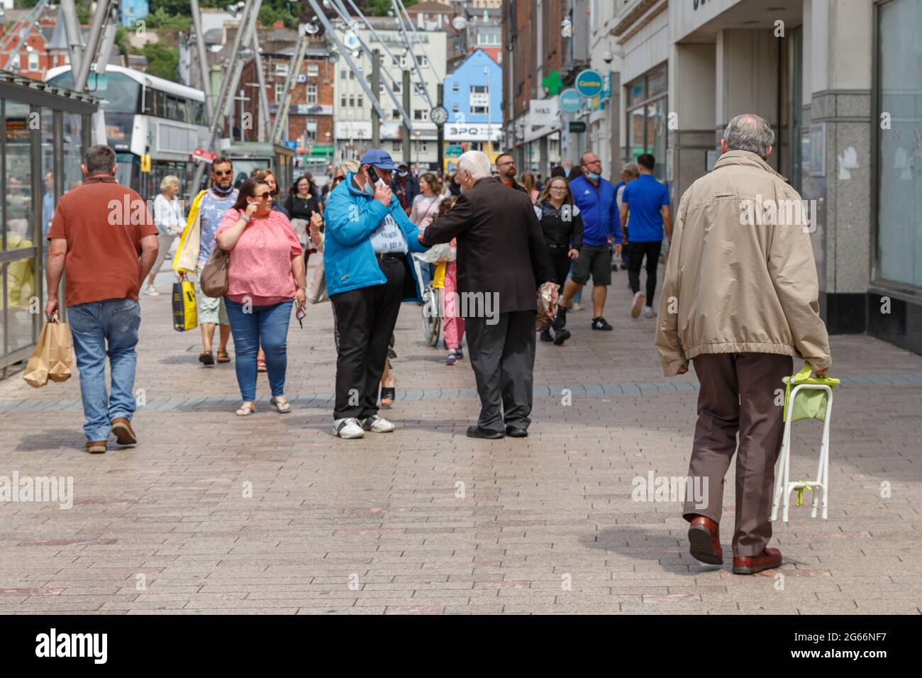 Cork, Ireland. 3rd July, 2021. Shoppers Brave City Despite Thunderstorms Forecasted, Cork, Ireland. Many shoppers braved the city today despite mixed weather forecasts throughout the day. The sun shined on the city for the majority of the afternoon with some scattered showers and as well as forecast thunderstorms in the afternoon. Credit: Damian Coleman/Alamy Live News Stock Photo