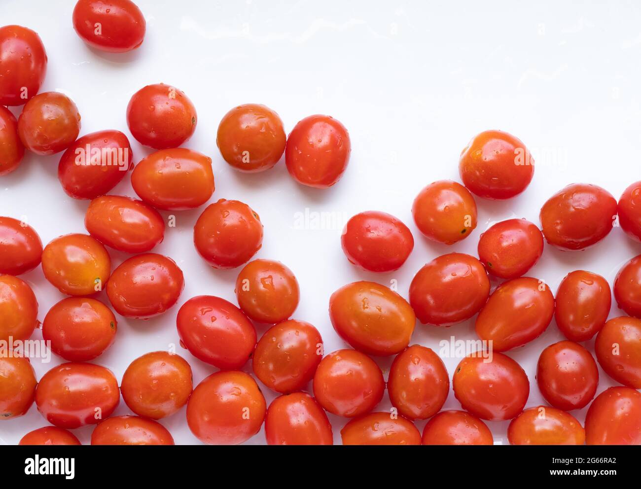 High angle view of full frame image of bright red tomatoes. Stock Photo