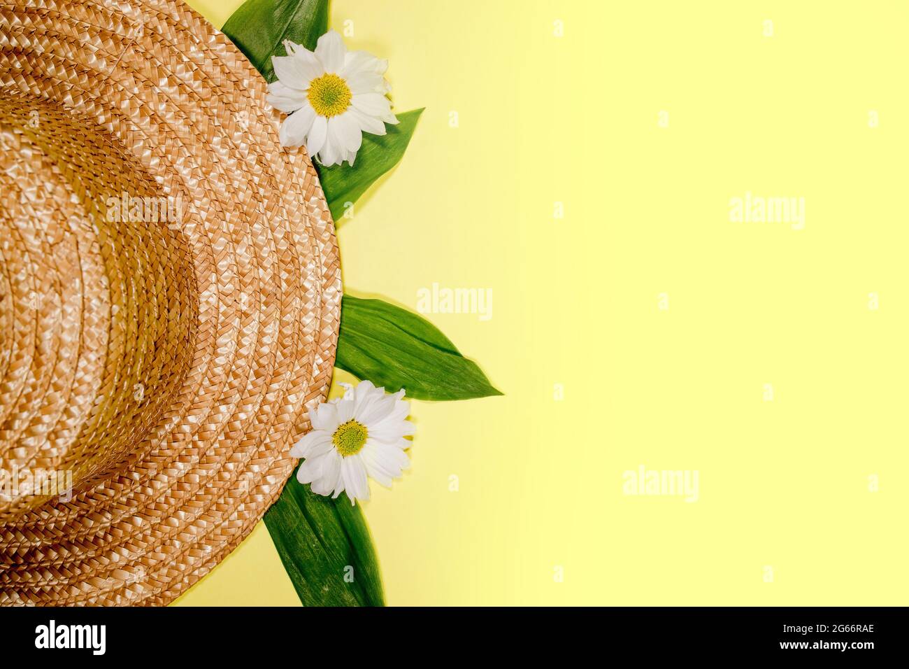 Womens summer straw hat on yellow background top view flat lay copy ...