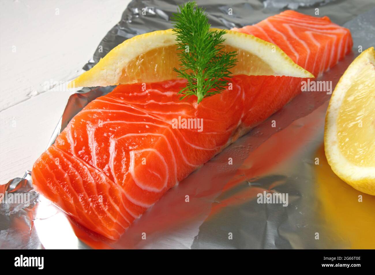 A fresh organic salmon fillet on aluminium foil Stock Photo - Alamy