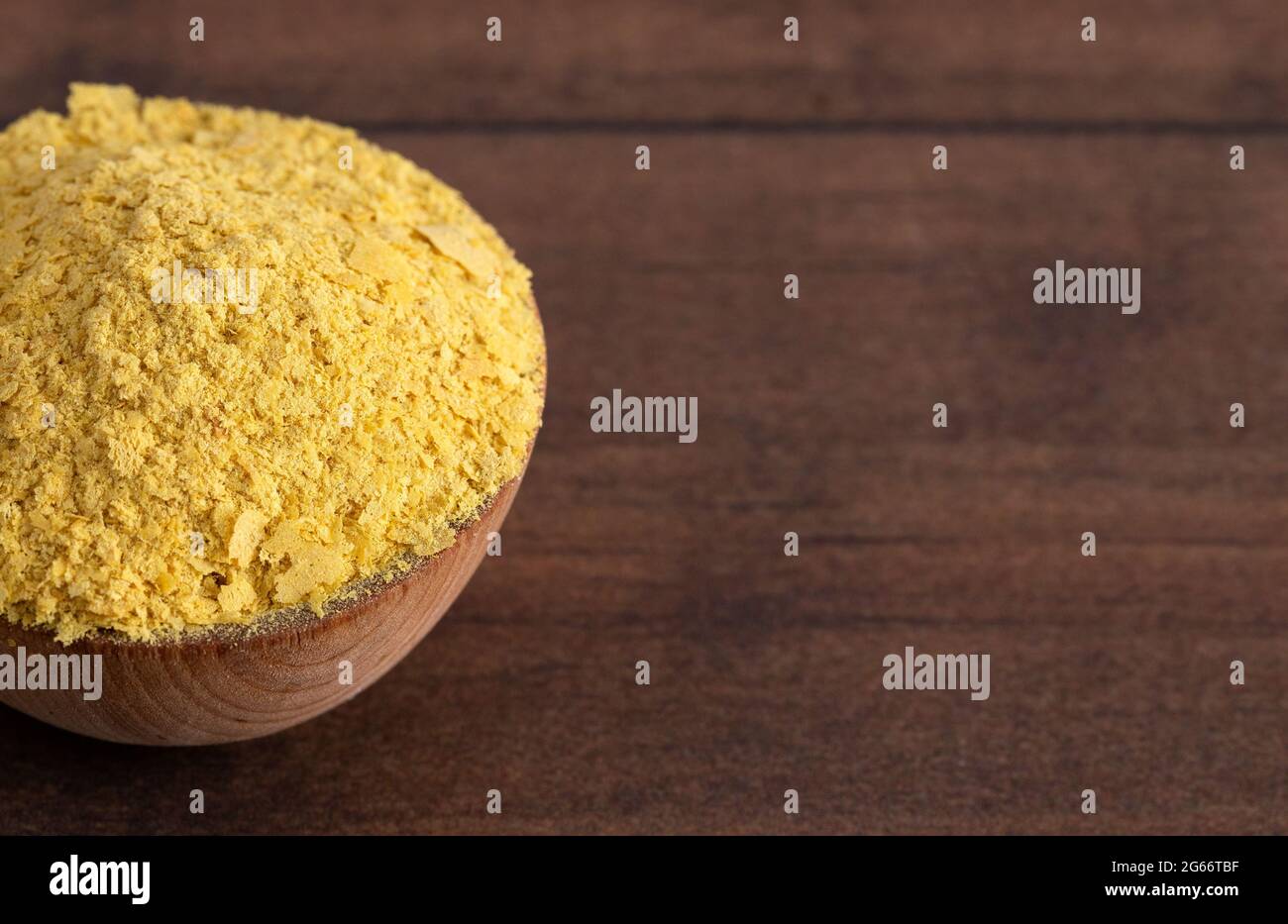 Flakes of Yellow Nutritional Yeast a Cheese Substitute and Seasoning
