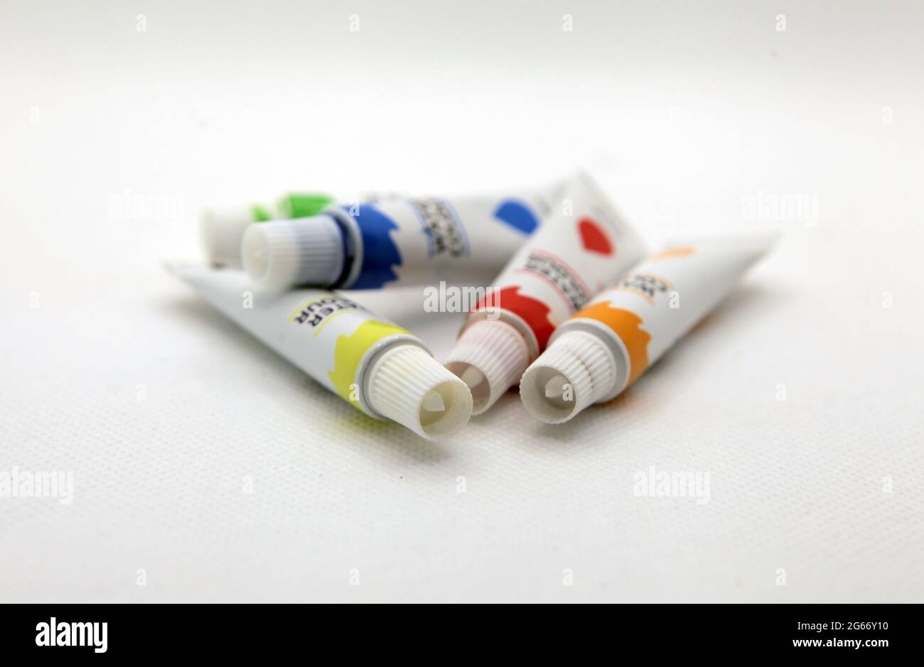 Group shot of watercolor stacks on white background Stock Photo