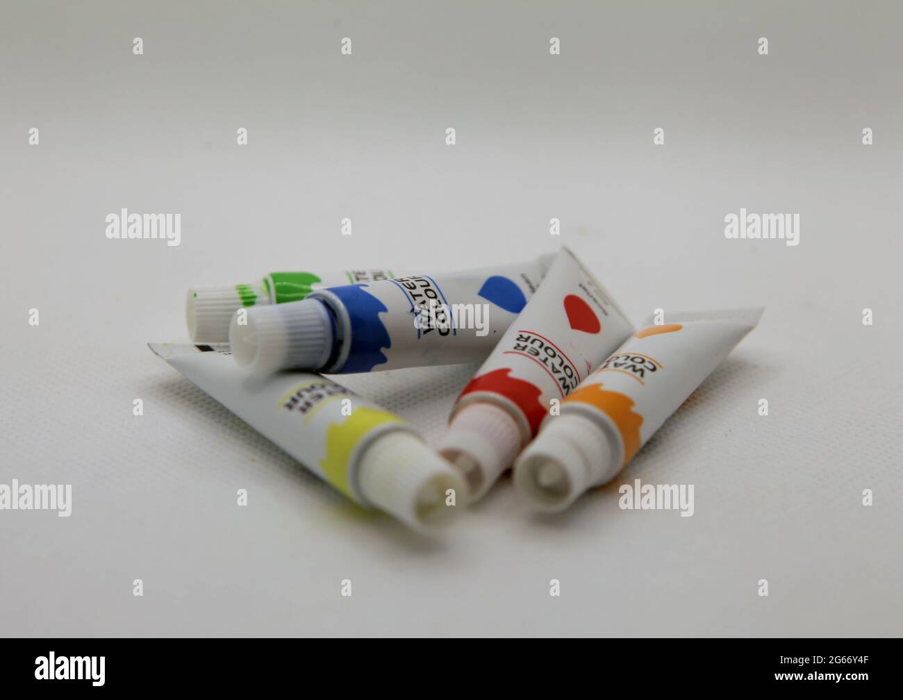 Group shot of watercolor stacks on white background Stock Photo