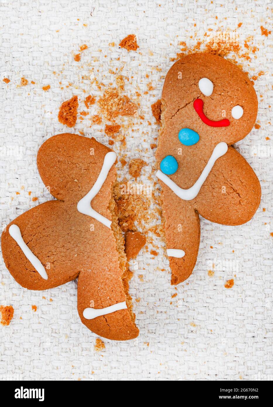 gingerbread man that's broken with crumbs Stock Photo Alamy