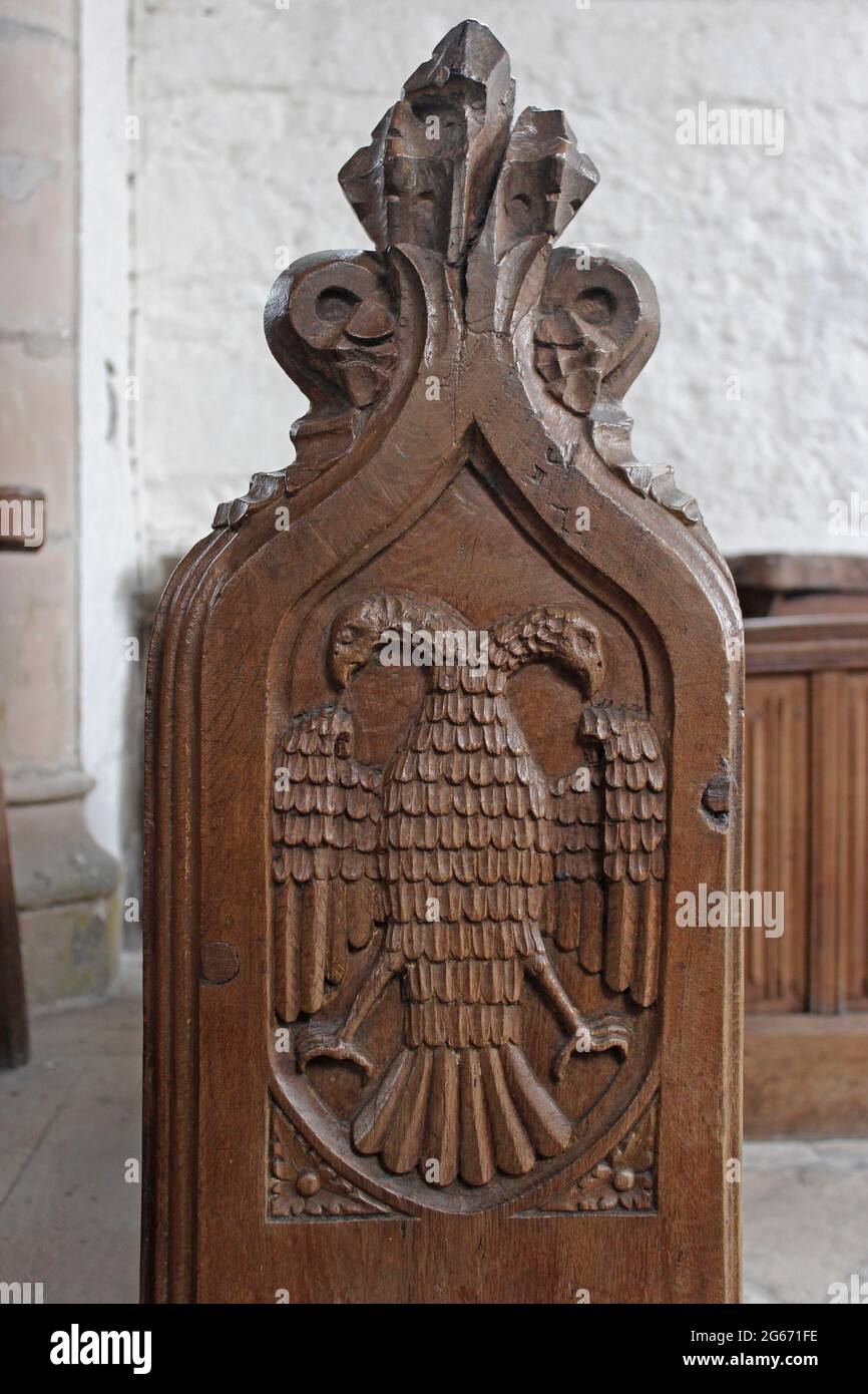 Double Headed Eagle On Choir Stall dating to 16th Century at St Beunos, Clynnog Fawr, Wales Stock Photo