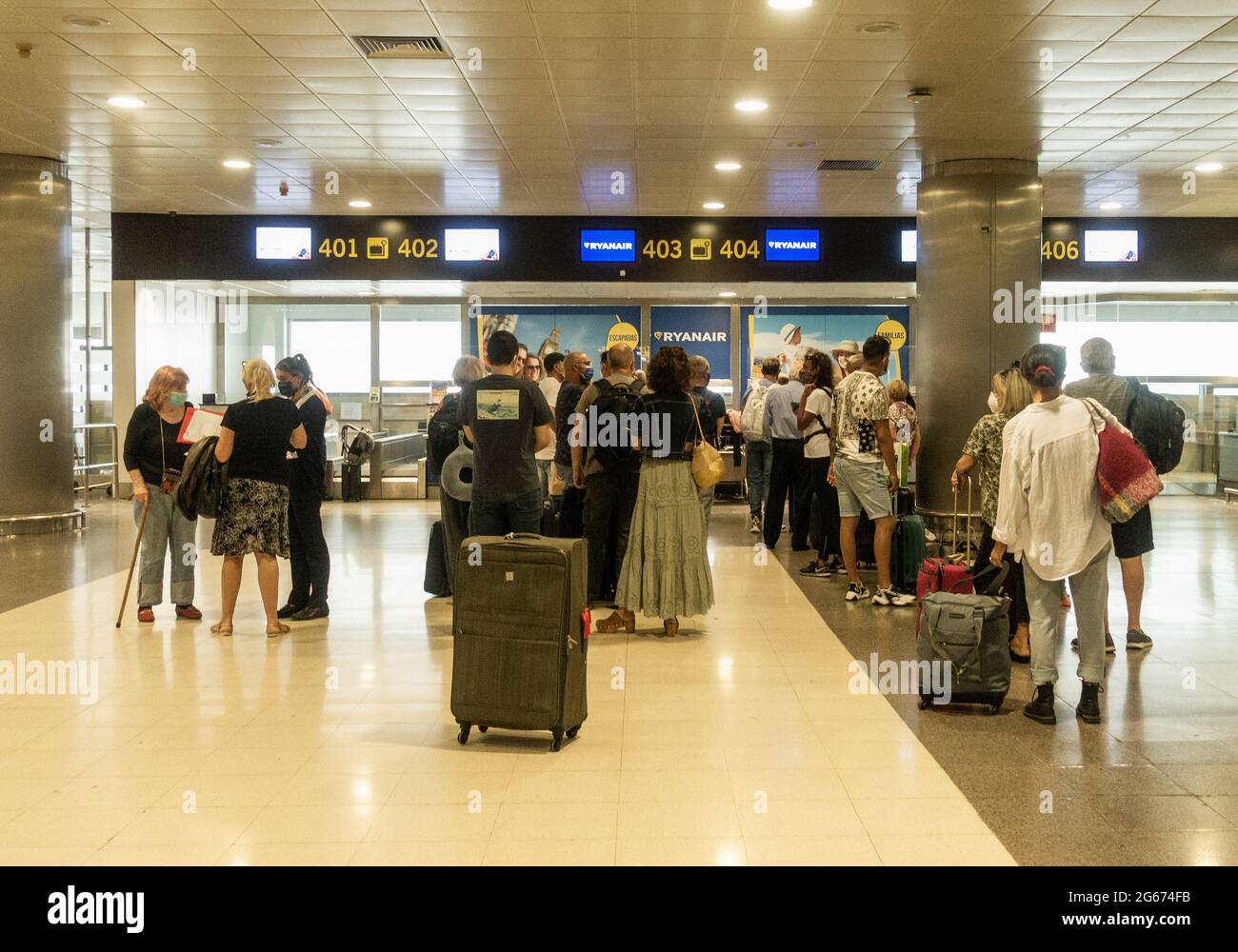 Las Palmas, Gran Canaria, Canary Islands, Spain. 3rd July, 2021. German  tourists checking in for return flights to Germany at Gran Canaria airport.  The Canary Islands remain on the Amber list for