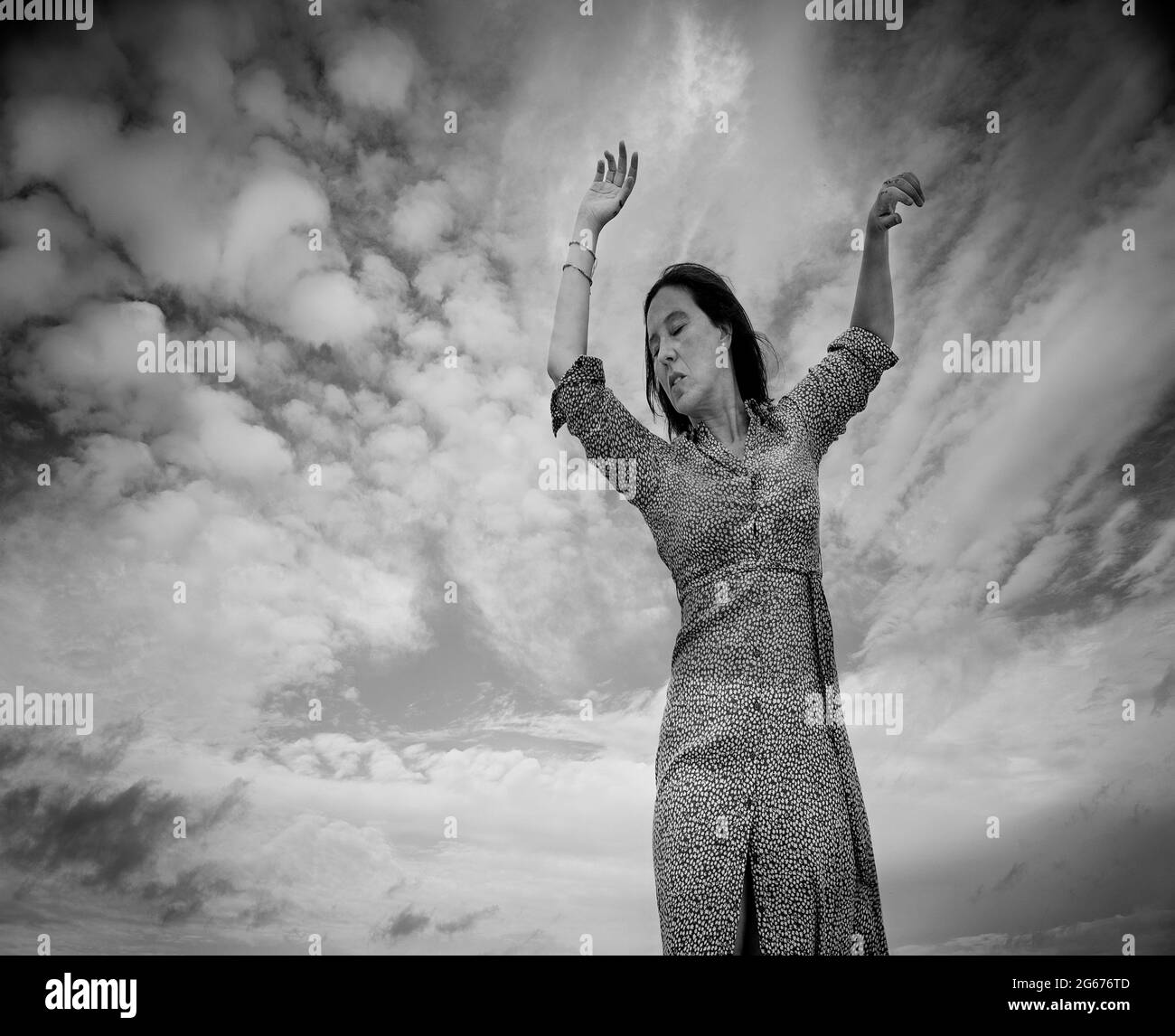 woman in long dress dancing on the beach IV Stock Photo - Alamy
