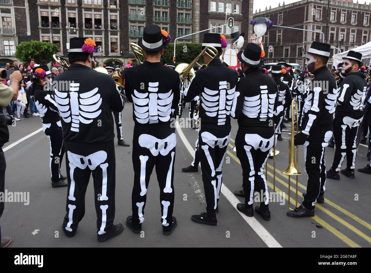 Day of the Dead parade in the zocalo in Mexico City. Stock Photo