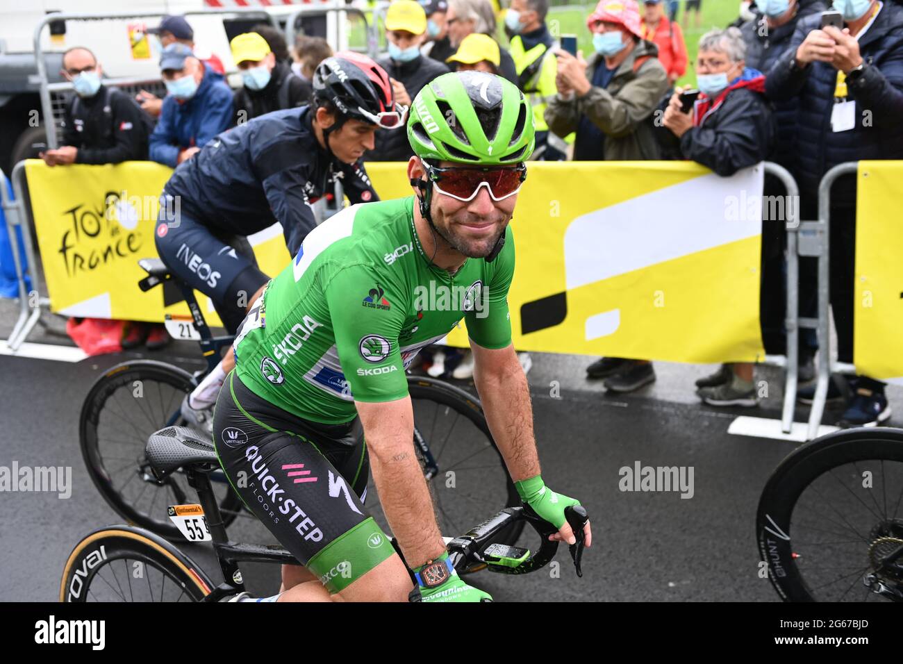 Great Britain's Mark Cavendish for Deceuninck Quick Step retains his  overall lead in the points category wearing the green jersey on the podium  during stage 8 of the Tour de France, Oyonnax