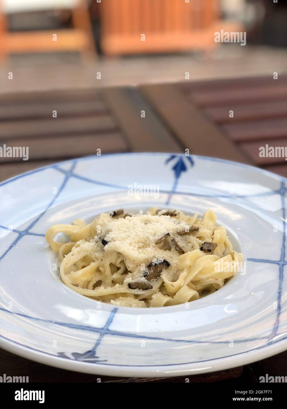 Homemade pasta with mushroom truffles in a creamy sauce sprinkled with