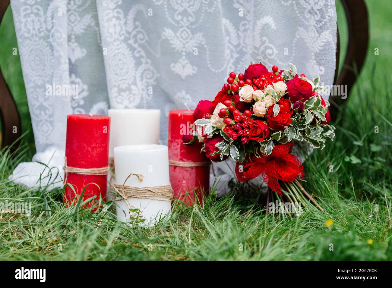 Expensive, trendy wedding bouquet of roses in marsala and red colors ...